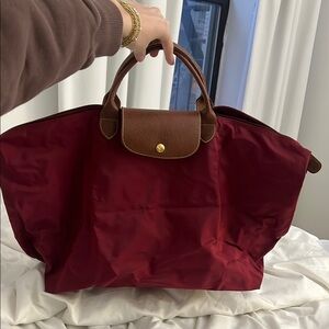 Burgundy Longchamp travel bag